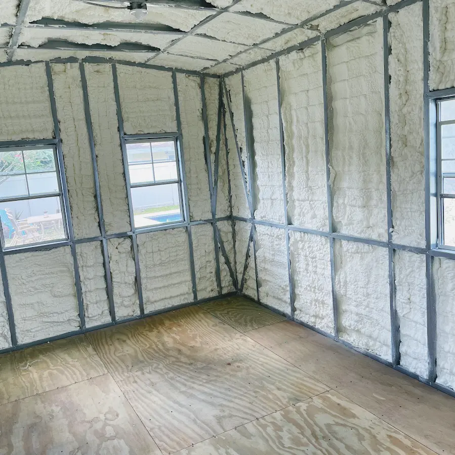 Closed-cell spray foam insulation applied to wall cavities in a residential project in Whitefish
